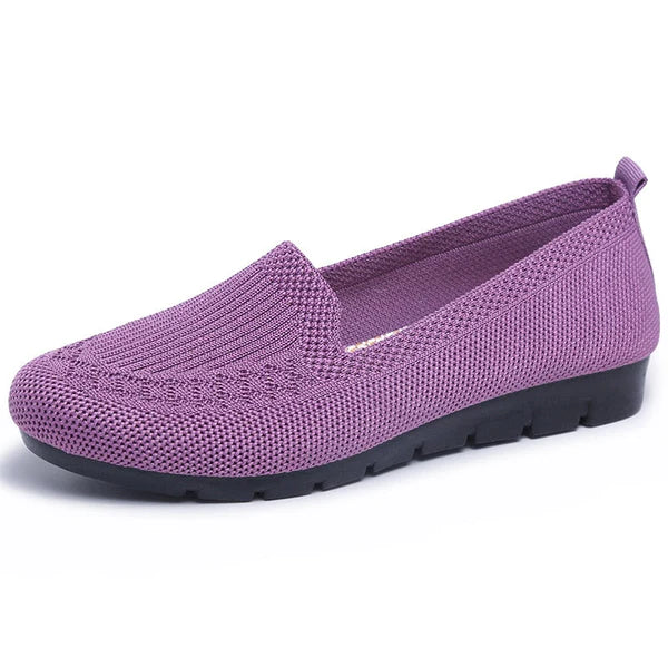 Paarse dames instapper met gebreid bovenwerk en zwarte zool, comfortabele casual schoen, ademend en lichtgewicht, ideaal voor dagelijks gebruik.
